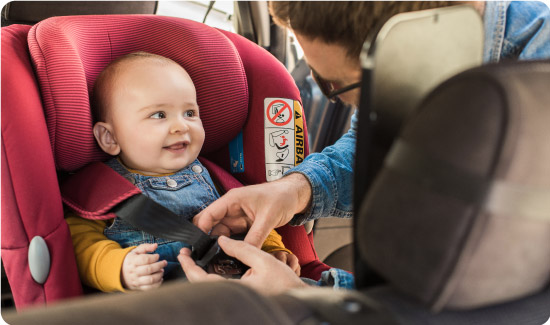 Baby Being Put iNto Car Seat
