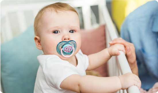 Baby in a cot
