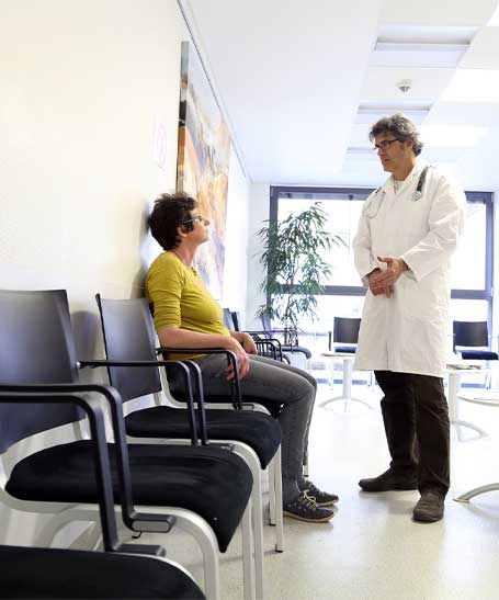 Doctor and patient in waiting room