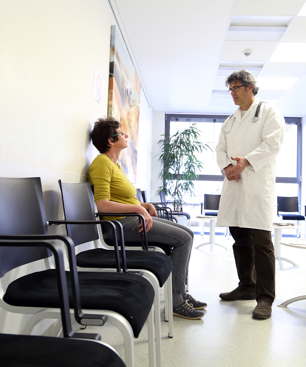 Doctor and patient in waiting room