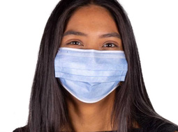 Girl wearing blue face covering