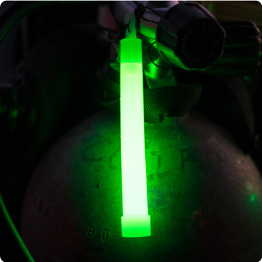 Green Lightstick glowing in the dark