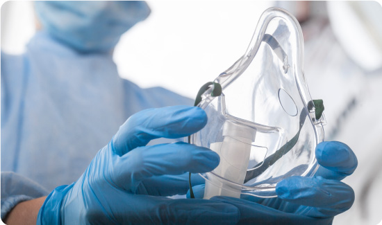 High Concentration Oxygen Mask Being Held