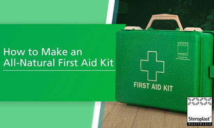 A green first aid kit with a white cross and handle displayed on a wooden surface. Text on a green background reads: 'How to Make an All-Natural First Aid Kit.'