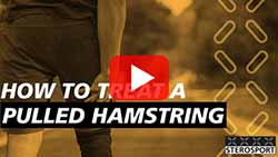 Video thumbnail with a person holding the back of their thigh. Text reads: 'How to Treat a Pulled Hamstring