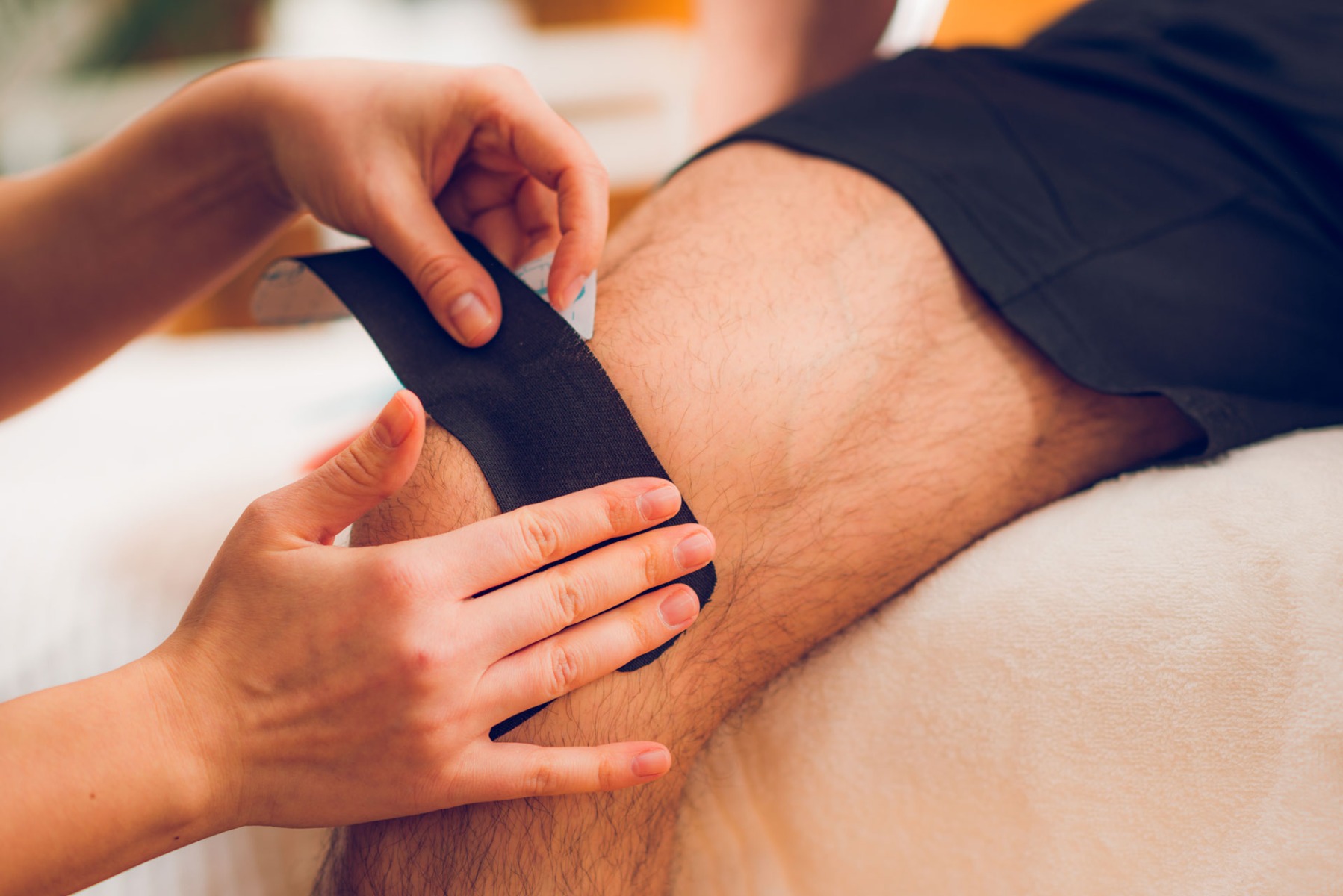Taping athlete's knee pain