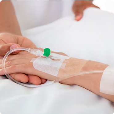 Intravenous infusion line in a patients hand