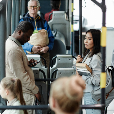 People commuting on a bus
