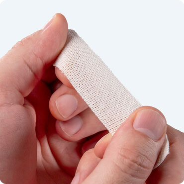 2.5cm elastic adhesive bandage in hand