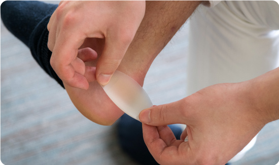 Blister Plaster Being Applied to Foot