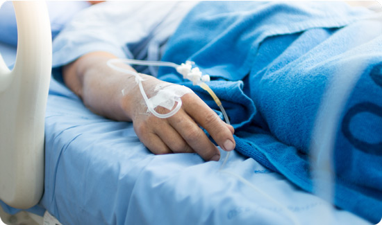 Patient in Hospital Bed