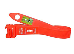 An orange S.T.A.T. Tourniquet with a loop handle and instructions printed on the strap, designed for quick application in trauma situations.