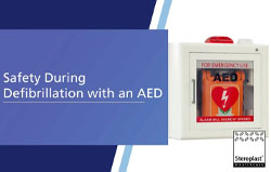 A banner featuring an AED cabinet with the words 