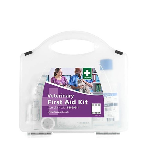 A white Veterinary First Aid Kit with a purple label featuring two professionals examining a dog. The label mentions compliance with BS8599-1 standards.