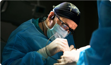 Surgeon performing brain surgery