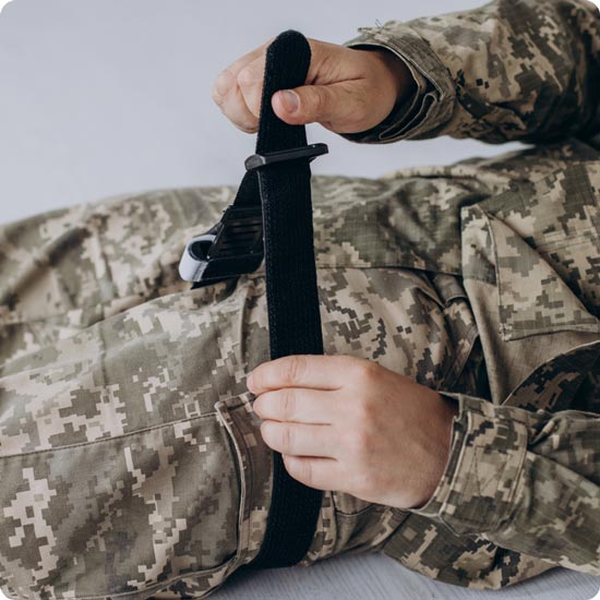 Tourniquet Being Used on Soldiers Leg
