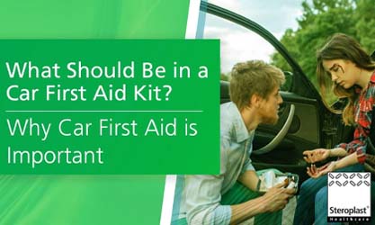 A man assisting a woman with a first aid kit outside a car, set against a green backdrop with the text: 'What Should Be in a Car First Aid Kit? Why Car First Aid is Important.