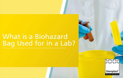 Image of a person wearing gloves placing a sample into a yellow biohazard container, with a yellow banner reading 'What is a Biohazard Bag Used for in a Lab?' and the Steroplast logo.