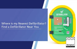 A banner featuring a green and yellow AED cabinet on the right with the title 