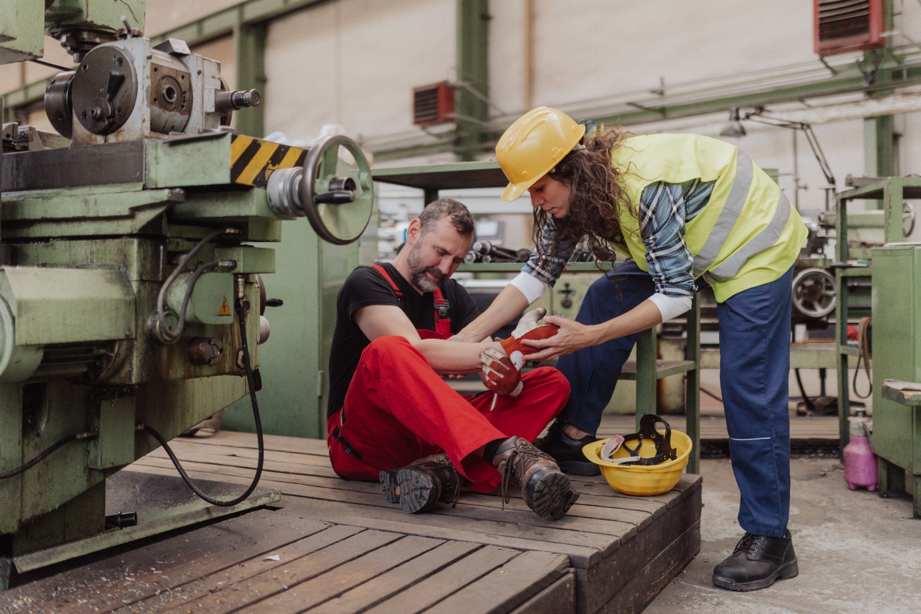 First aider in the workplace with injured worker