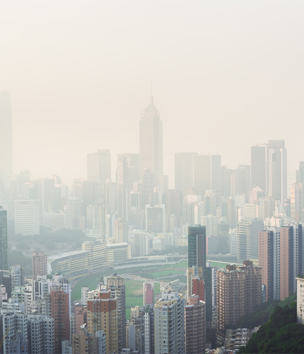 city with sky scrapers and a smoggy sky line